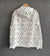 Monogram Windbreaker